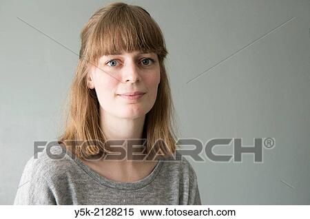 Studio Tuinstraat, Tuinstraat, Tilburg, Netherlands. Studio portrait of an young, attractive, blonde woman. View Large Photo Image Stock Photography - Studio Tuinstraat, Tuinstraat, Tilburg, Netherlands. Studio portrait of an young, attractive, blonde woman.. Fotosearch