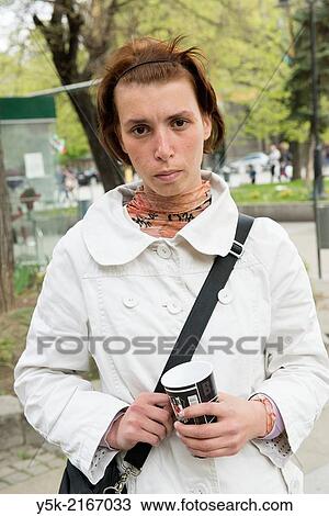 Svetja Nedelya Church, Sofia, Bulgaria. Young Roma woman, in het twenties, begging in the streets of Sofia for scraps of money. Many Bulgarian and Roma people consider this a valid way to gain income. View Large Photo Image Stock Image - Svetja Nedelya Church, Sofia, Bulgaria. Young Roma woman, in het twenties, begging in the streets of Sofia for scraps of money. Many Bulgarian and Roma people consider this a valid way to gain income.. Fotosearch