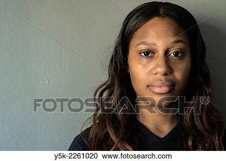 Tilburg, Netherlands, Studio portrait and close up of a dark skinned woman from Africa descent. View Large Photo Image Stock Image - Tilburg, Netherlands, Studio portrait and close up of a dark skinned woman from Africa descent.. Fotosearch