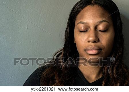 Tilburg, Netherlands, Studio portrait and close up of a dark skinned woman from Africa descent. View Large Photo Image Stock Image - Tilburg, Netherlands, Studio portrait and close up of a dark skinned woman from Africa descent.. Fotosearch