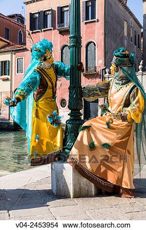 Two masked women at the carnival in Venice, Italy, Europe View Large Photo Image Picture - Two masked women at the carnival in Venice, Italy, Europe. Fotosearch