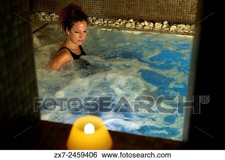 Woman in the jacuzzi. Hotel Es Marès - San Francisco Javierâ. Ž, Formentera Island, Balearic islands, Spain. San Francesc Xavier. A perfect boutique hotel in Formentera. Outdoor pool in a unique point on the island of Formentera. View Large Photo Image Stock Photograph - Woman in the jacuzzi. Hotel Es Marès - San Francisco Javierâ. Ž, Formentera Island, Balearic islands, Spain. San Francesc Xavier. A perfect boutique hotel in Formentera. Outdoor pool in a unique point on the island of Formentera.. Fotosearch