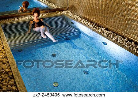Woman in the jacuzzi. Hotel Es Marès - San Francisco Javierâ. Ž, Formentera Island, Balearic islands, Spain. San Francesc Xavier. A perfect boutique hotel in Formentera. Outdoor pool in a unique point on the island of Formentera. View Large Photo Image Stock Photography - Woman in the jacuzzi. Hotel Es Marès - San Francisco Javierâ. Ž, Formentera Island, Balearic islands, Spain. San Francesc Xavier. A perfect boutique hotel in Formentera. Outdoor pool in a unique point on the island of Formentera.. Fotosearch