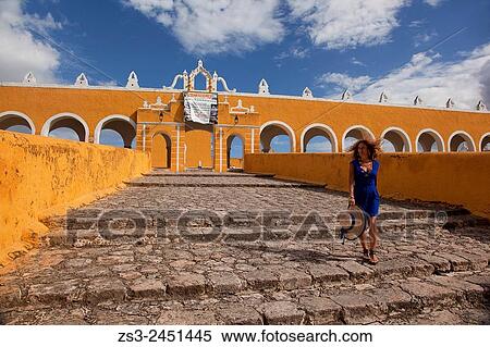 Stock Photography - Women at the stairs of the Monastery, Convent Of San Antonio De Padua, Izamal, Yucatan, Yucatan Province, Mexico, Central America.. Fotosearch