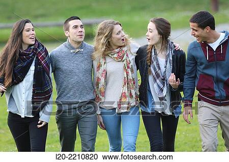 Stock Image - Young students at campus. Fotosearch