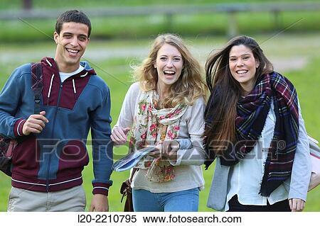 Stock Photography - Young students at campus. Fotosearch