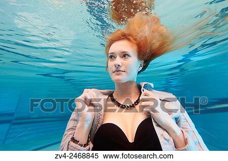 A young woman under water in a swimming bath. View Large Photo Image Stock Photography - A young woman under water in a swimming bath.. Fotosearch