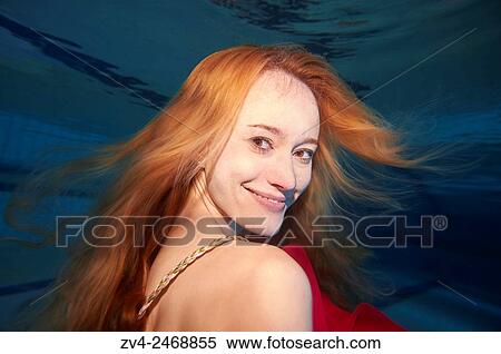 A young woman under water in a swimming bath. View Large Photo Image Stock Photography - A young woman under water in a swimming bath.. Fotosearch
