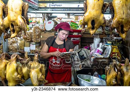 Asia. Thailand, Chiang Mai. Market of Warorot. Saleswoman in a chicken shop. View Large Photo Image Picture - Asia. Thailand, Chiang Mai. Market of Warorot. Saleswoman in a chicken shop.. Fotosearch