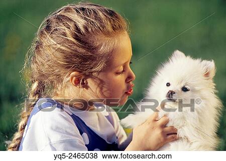 Child playing with dog. View Large Photo Image Stock Photo - Child playing with dog.. Fotosearch