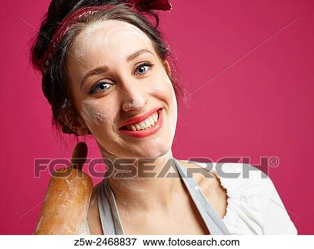 Close up, funny housewife and kitchen utensil, pink background. View Large Photo Image Stock Photo - Close up, funny housewife and kitchen utensil, pink background.. Fotosearch
