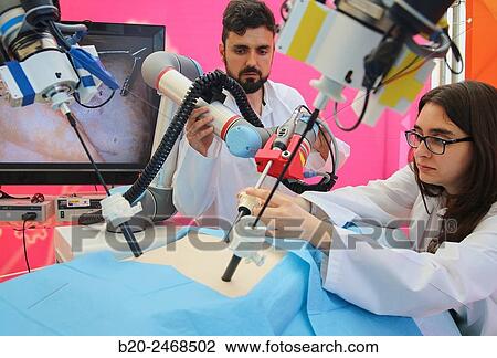 Development of a surgical robot with 3D vision and tactile sensations. View Large Photo Image Stock Image - Development of a surgical robot with 3D vision and tactile sensations.. Fotosearch