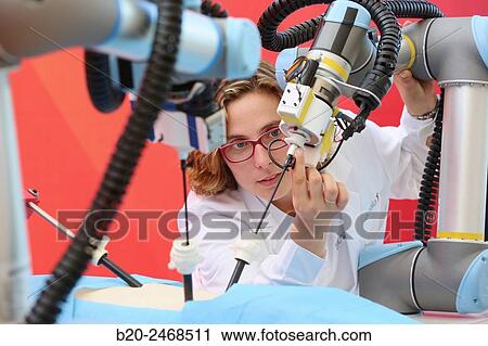 Stock Image - Development of a surgical robot with 3D vision and tactile sensations.. Fotosearch