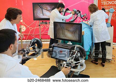 Development of a surgical robot with 3D vision and tactile sensations. View Large Photo Image Stock Photo - Development of a surgical robot with 3D vision and tactile sensations.. Fotosearch