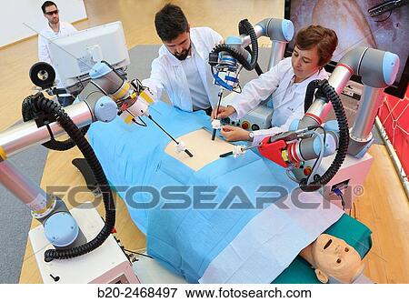 Stock Photo - Development of a surgical robot with 3D vision and tactile sensations.. Fotosearch