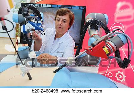 Stock Photo - Development of a surgical robot with 3D vision and tactile sensations.. Fotosearch
