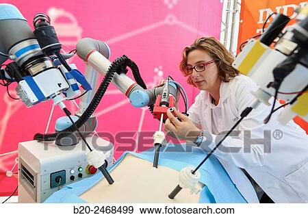 Development of a surgical robot with 3D vision and tactile sensations. View Large Photo Image Stock Photo - Development of a surgical robot with 3D vision and tactile sensations.. Fotosearch