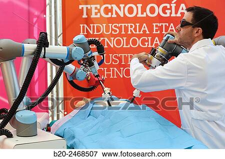 Stock Photo - Development of a surgical robot with 3D vision and tactile sensations.. Fotosearch