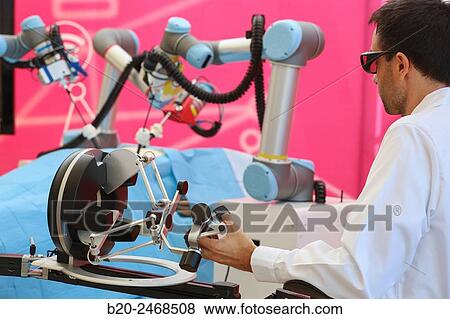 Stock Photo - Development of a surgical robot with 3D vision and tactile sensations.. Fotosearch