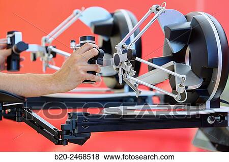 Stock Photo - Development of a surgical robot with 3D vision and tactile sensations.. Fotosearch