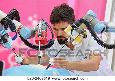 Stock Photo - Development of a surgical robot with 3D vision and tactile sensations.. Fotosearch