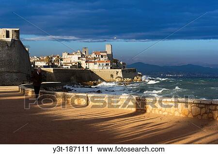 Europe, France, Alpes-Maritimes, Antibes. Retired walking in the old town. View Large Photo Image Stock Image - Europe, France, Alpes-Maritimes, Antibes. Retired walking in the old town.. Fotosearch