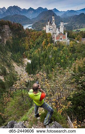 Germany, Bavaria, Hohenschwangau, Schloss Neuschwanstein castle and photographer, elevated view, R. View Large Photo Image Stock Photograph - Germany, Bavaria, Hohenschwangau, Schloss Neuschwanstein castle and photographer, elevated view, R.. Fotosearch