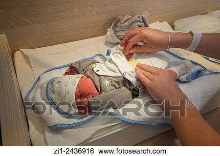 hands changing napkin of new born baby in hospital View Large Photo Image Stock Photograph - hands changing napkin of new born baby in hospital. Fotosearch