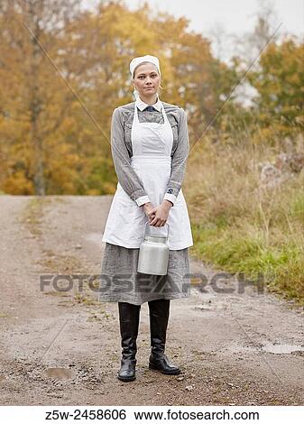Historic costume theme World War II, Finnish Lotta. Photographed in the Ragvalds museum area in Kirkkonummi, Finland. View Large Photo Image Stock Photograph - Historic costume theme World War II, Finnish Lotta. Photographed in the Ragvalds museum area in Kirkkonummi, Finland.. Fotosearch