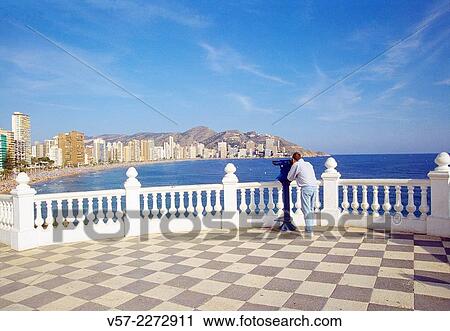 Man at the viewpoint. Benidorm, Alicante province, Comunidad Valenciana, Spain. View Large Photo Image Stock Image - Man at the viewpoint. Benidorm, Alicante province, Comunidad Valenciana, Spain.. Fotosearch