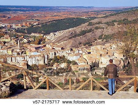 Man at the viewpoint over the city. Cuenca, Castilla La Mancha, Spain. View Large Photo Image Stock Photo - Man at the viewpoint over the city. Cuenca, Castilla La Mancha, Spain.. Fotosearch