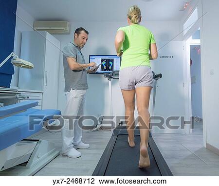 Podiatrist with a patient. View Large Photo Image Stock Image - Podiatrist with a patient.. Fotosearch