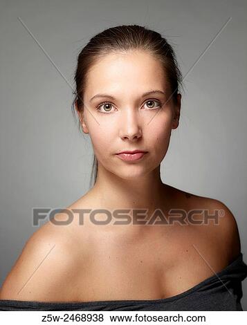 Stock Photo - Portrait, natural beautiful woman face, head and shoulder shot.. Fotosearch