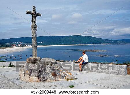 Stone cross and Langosteira beach. Fisterra, La Coru±a province, Galicia, Spain. View Large Photo Image Stock Photo - Stone cross and Langosteira beach. Fisterra, La Coru±a province, Galicia, Spain.. Fotosearch
