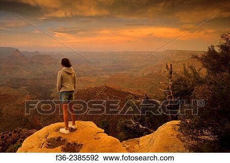 Tourist views sunset at Grand Canyon, from Grandview Point, South Rim, Grand Canyon Nat´l. Park, ARIZONA. View Large Photo Image Stock Image - Tourist views sunset at Grand Canyon, from Grandview Point, South Rim, Grand Canyon Nat´l. Park, ARIZONA.. Fotosearch