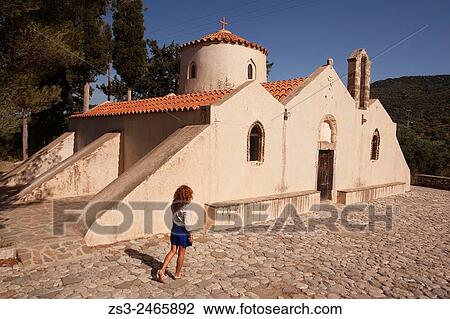 Woman in front of the Panagia Kera Church near Kritsa town, Lasithi Region, Crete, Greek Islands, Greece, Europe. View Large Photo Image Stock Image - Woman in front of the Panagia Kera Church near Kritsa town, Lasithi Region, Crete, Greek Islands, Greece, Europe.. Fotosearch