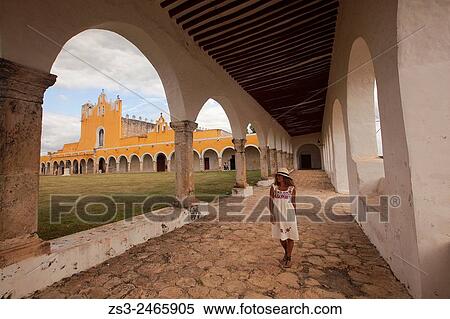 Stock Photography - Woman posing at Izamal convent, Monastery-Convent Of San Antonio De Padua, Izamal, Yucatan, Yucatan Province, Mexico, Central America.. Fotosearch