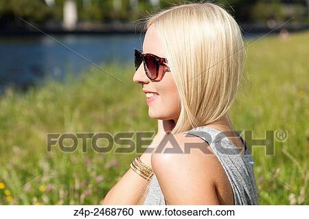 Young woman smiling. View Large Photo Image Stock Image - Young woman smiling.. Fotosearch