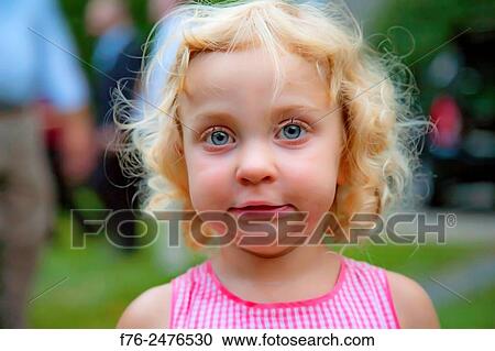 Stock Image - 4 year old girl with funny facial expression, MR# G110807_3.. Fotosearch