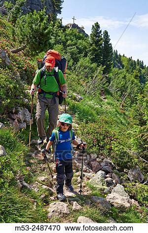 A father hiking with his four years daughter in the Lagorai Mountain Range. Province of Trento. Trentino-Alto Adige. Italy. View Large Photo Image Stock Image - A father hiking with his four years daughter in the Lagorai Mountain Range. Province of Trento. Trentino-Alto Adige. Italy.. Fotosearch