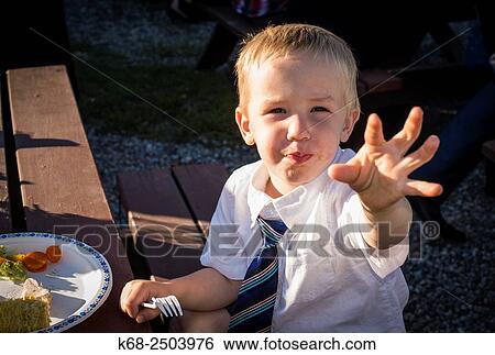 Stock Photograph - a four year old boy.. Fotosearch