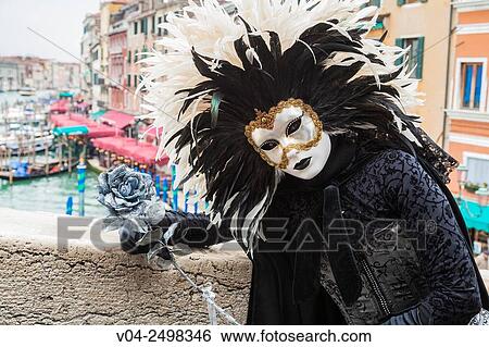 A masked woman at the carnival in Venice, Italy, Europe View Large Photo Image Stock Photograph - A masked woman at the carnival in Venice, Italy, Europe. Fotosearch