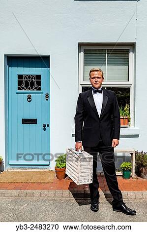 A Young Man En Route To Watch The Opera At Glyndebourne Opera House, Sussex, UK. View Large Photo Image Stock Image - A Young Man En Route To Watch The Opera At Glyndebourne Opera House, Sussex, UK.. Fotosearch
