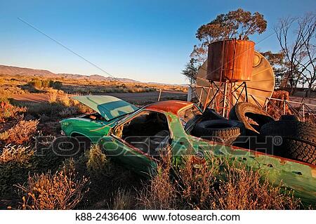 Stock Photograph - Abandoned car at outback settlement. Parachilna, Flinders Ranges, South Australia.. Fotosearch
