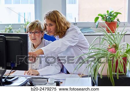 Stock Photography - Administrative in office, Human Resources Department, Hospital Donostia, San Sebastian, Gipuzkoa, Basque Country, Spain. Fotosearch