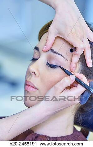 Applying make up. Hairdressing salon and Beauty Clinic. View Large Photo Image Stock Image - Applying make up. Hairdressing salon and Beauty Clinic.. Fotosearch