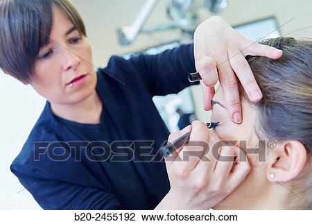 Applying make up. Hairdressing salon and Beauty Clinic. View Large Photo Image Stock Image - Applying make up. Hairdressing salon and Beauty Clinic.. Fotosearch