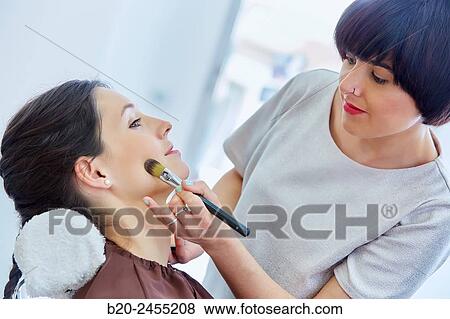 Applying make up. Hairdressing salon and Beauty Clinic. View Large Photo Image Stock Photo - Applying make up. Hairdressing salon and Beauty Clinic.. Fotosearch