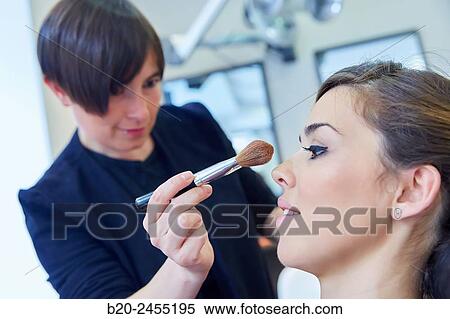 Applying make up. Hairdressing salon and Beauty Clinic. View Large Photo Image Stock Photography - Applying make up. Hairdressing salon and Beauty Clinic.. Fotosearch