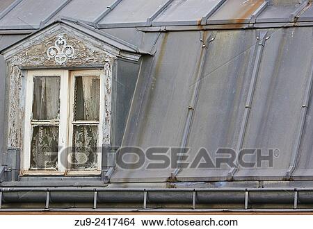 Picture - Attic window in rooftop room, Paris, France, Europe.. Fotosearch